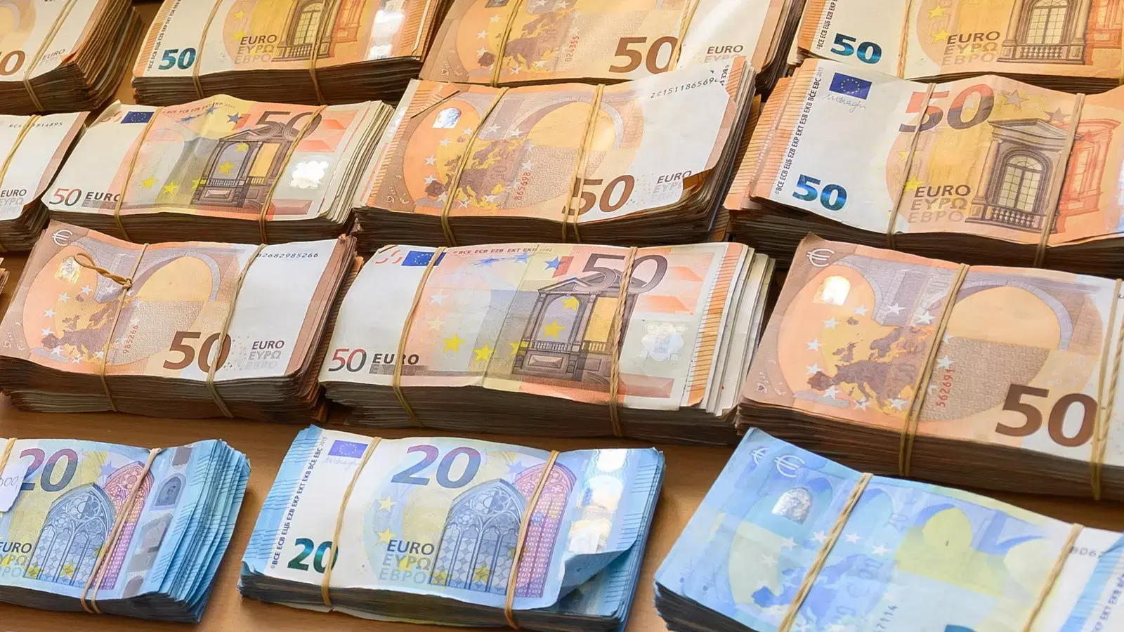 Cash on a table, symbolising fines for selling age-restricted products online